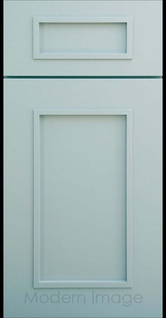 Gilbert cabinet a recessed flat panel and elevated molding in Niebla Azul color.